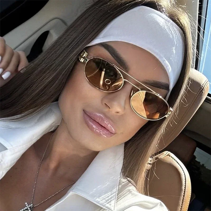 Damen elegante ovale Sonnenbrille mit luxuriösem Metallrahmen Karnz